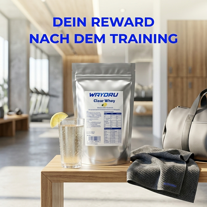 WAYDRU Clear Whey Shaker und Beutel in einem modernen Fitnessstudio – die ideale Belohnung und Erfrischung nach dem Training.